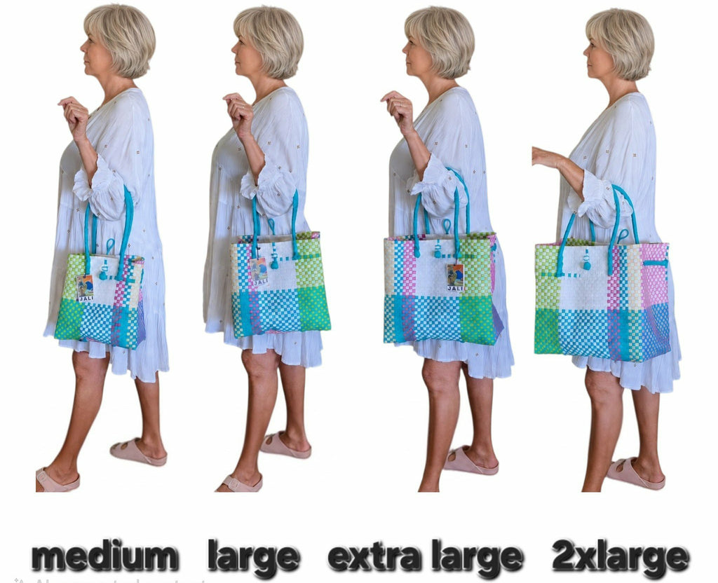 Four side-profile views of a woman wearing a white dress and holding a colorful patchwork tote bag, shown with size labels at the bottom reading medium, large, extra large, and 2xlarge. The image appears to be a composite/size guide rather than a clean single product shot, so subject_type is best classified as Measurement Chart.