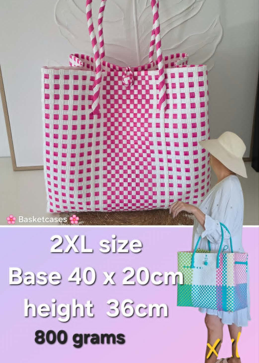 A pink and white gingham tote bag with striped handles is shown standing indoors next to a person wearing a hat and dress, with text overlay detailing the bag's size and weight.